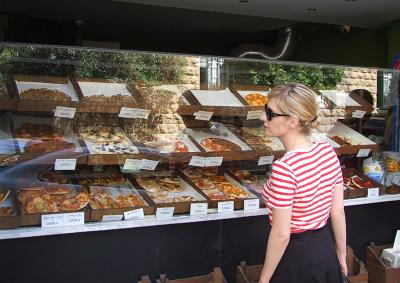 Writer MacKenzie Kassab browses a shop window in Lebanon