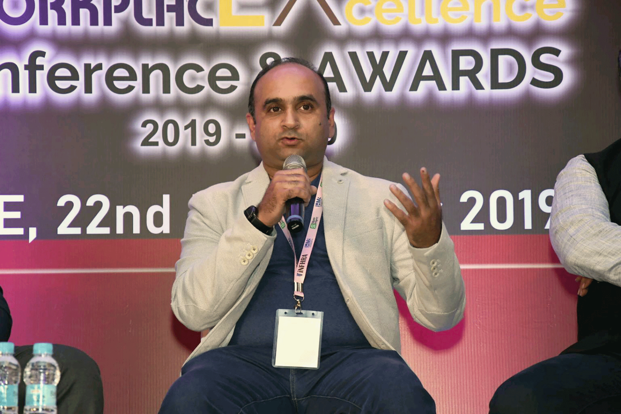 Swapnil Deshpande speaks on a panel discussion at a conference