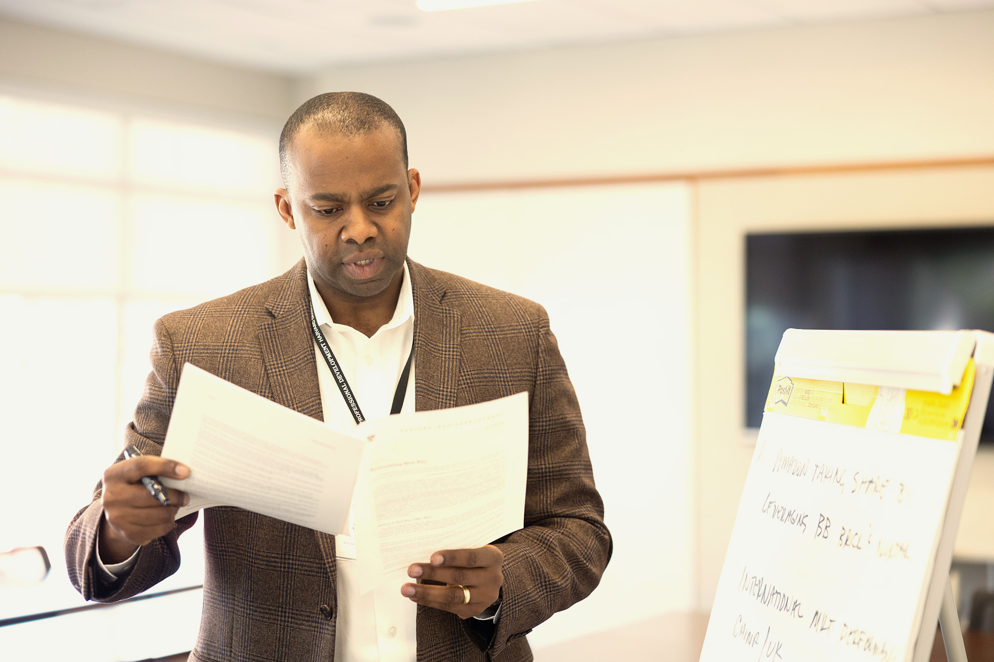 Man reading documents.